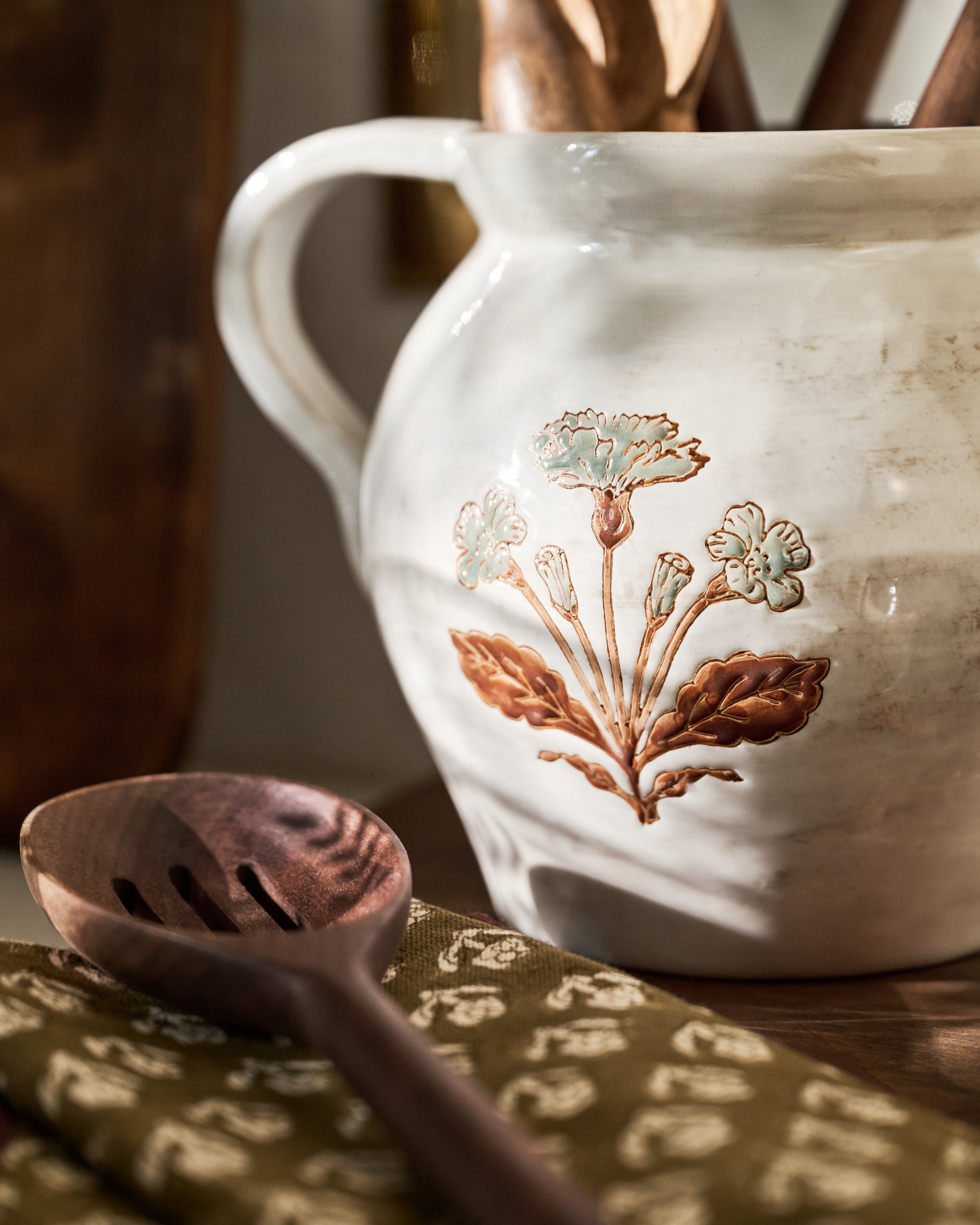 Elaine Floral Pitcher Crock close up next to wooden spoon