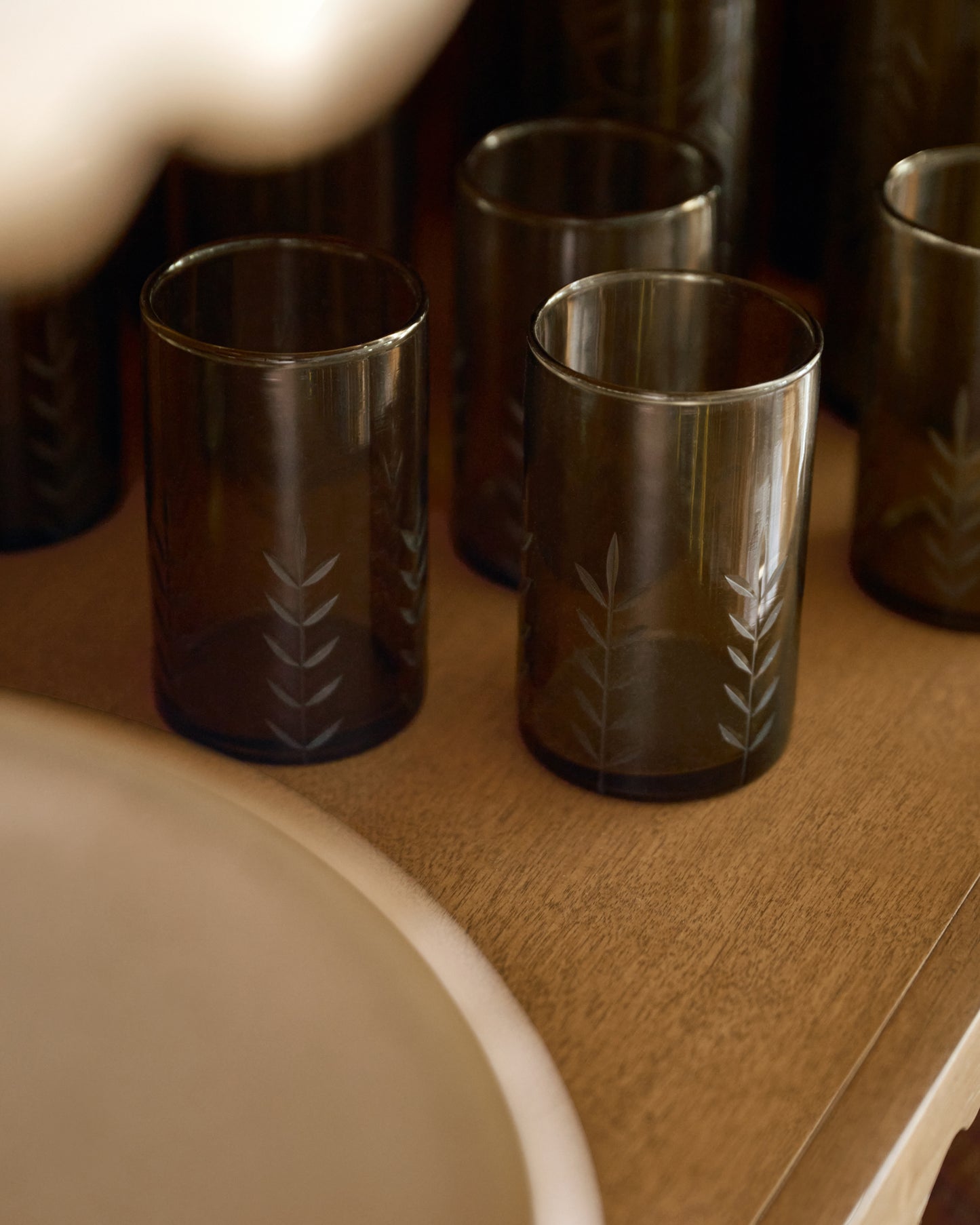 Recycled Etched Glass Tumbler, Brown Small on shelf