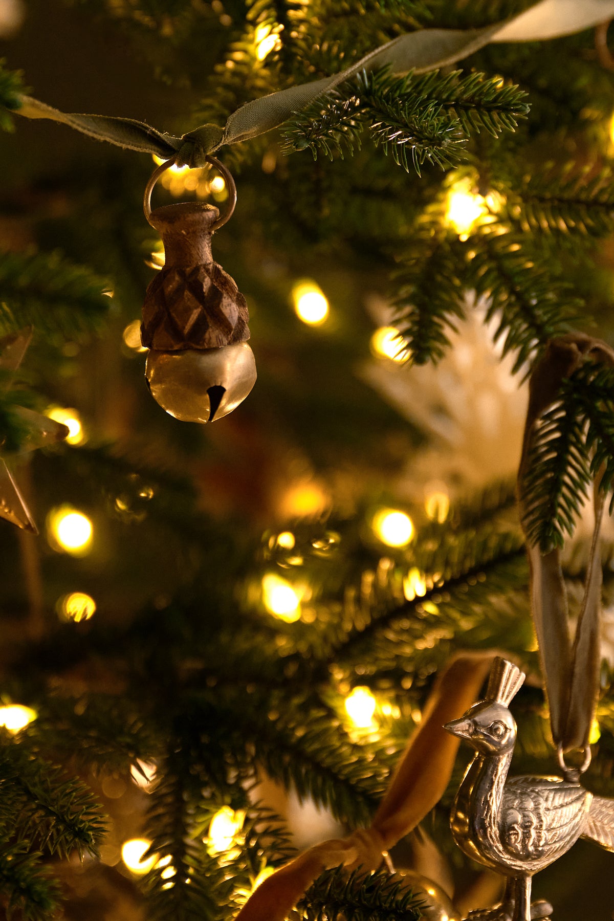 Acorn Jingle Bell + Velvet Garland on a tree