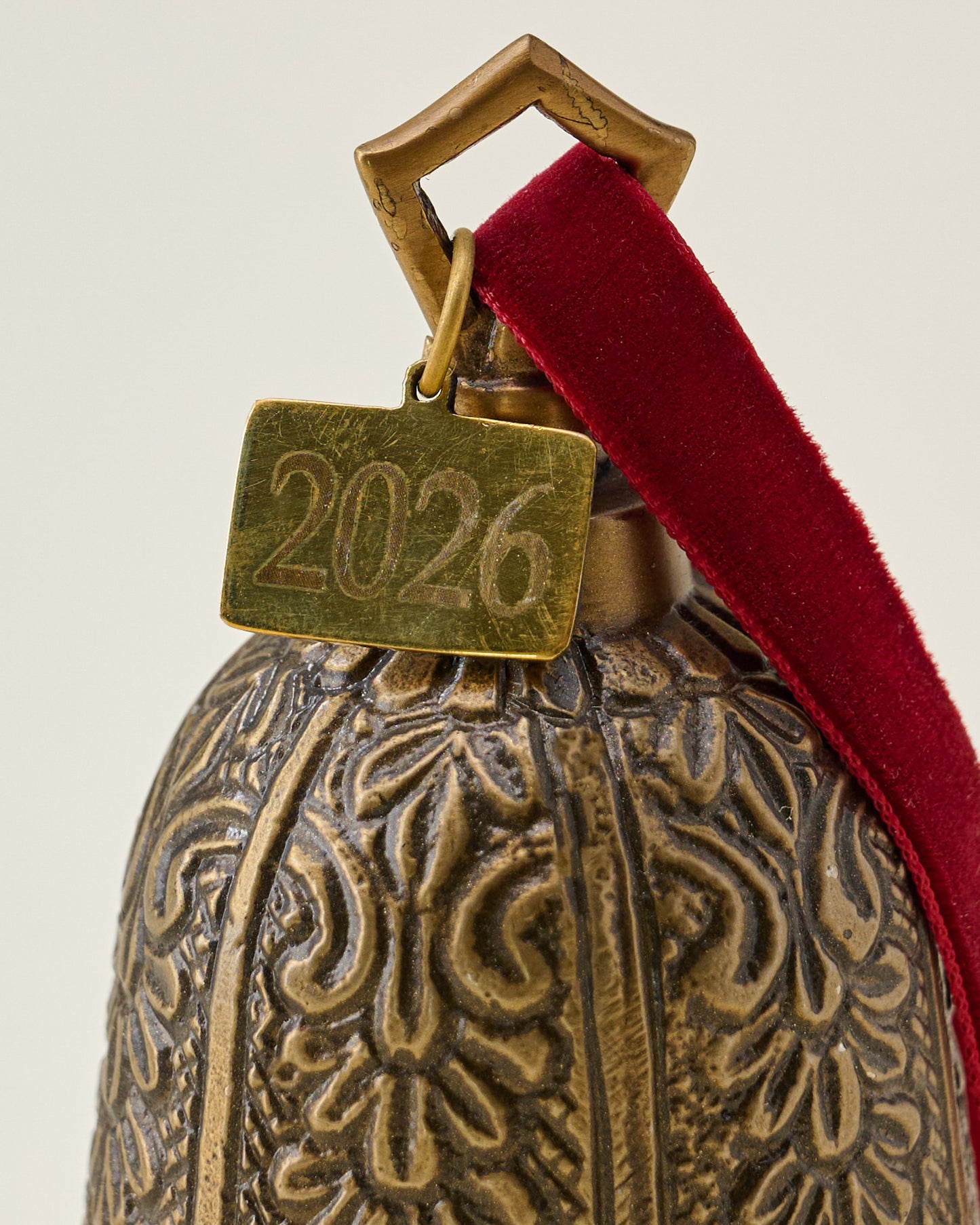 Antique Brass Floral Bell Ornament close up