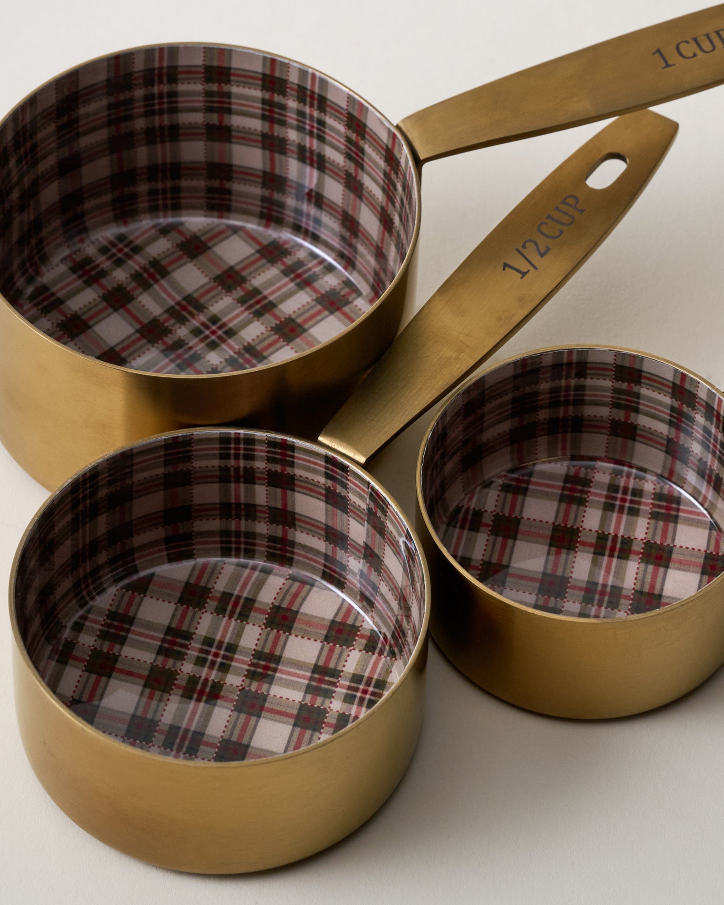 Brass + Enamel Plaid Measuring Cup close up