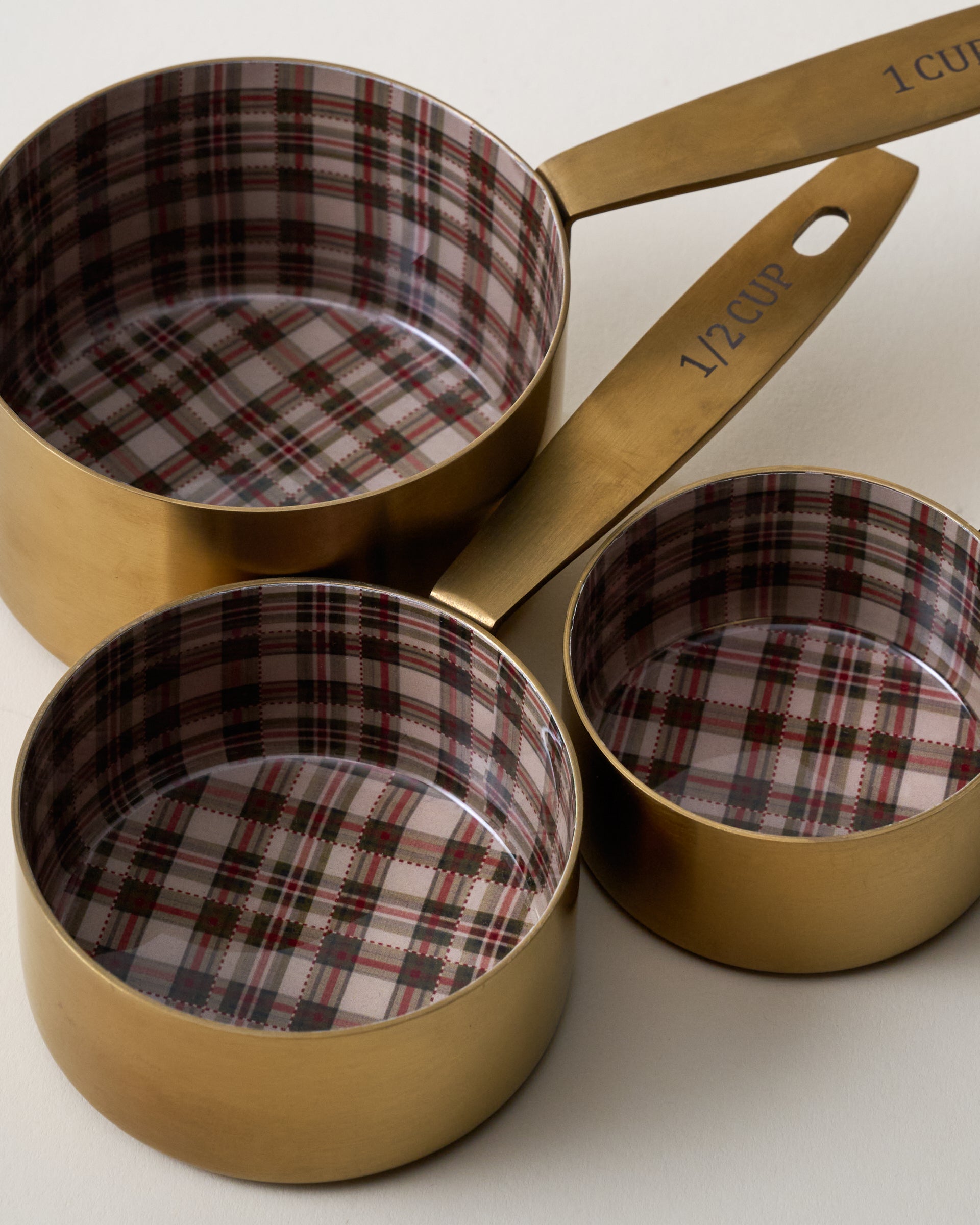 Brass + Enamel Plaid Measuring Cup close up