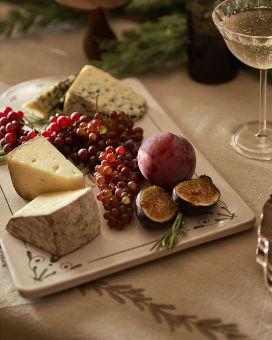 Cypress Heirloom Serving Board on a table
