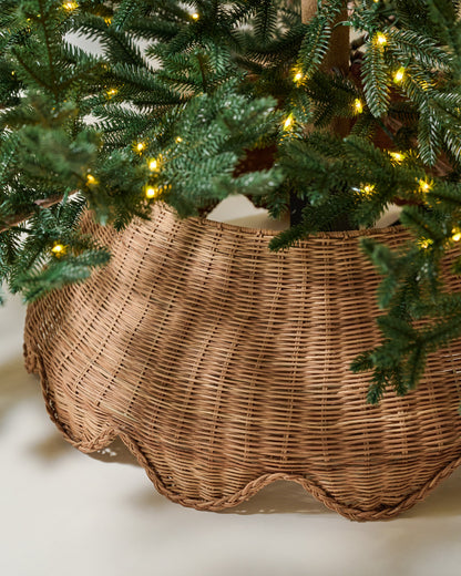 Solene Scalloped Rattan Tree Collar with a tree