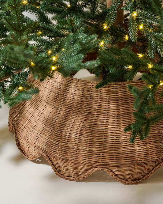Solene Scalloped Rattan Tree Collar with a tree