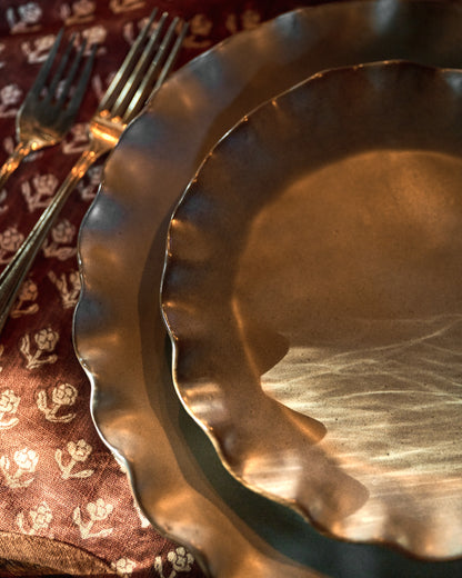 Green Organic Ruffle Edge Plate on table 