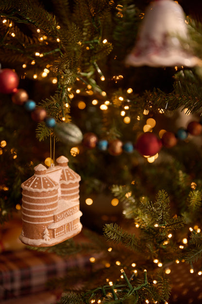 Magnolia Silos Gingerbread Ornament hanging on tree