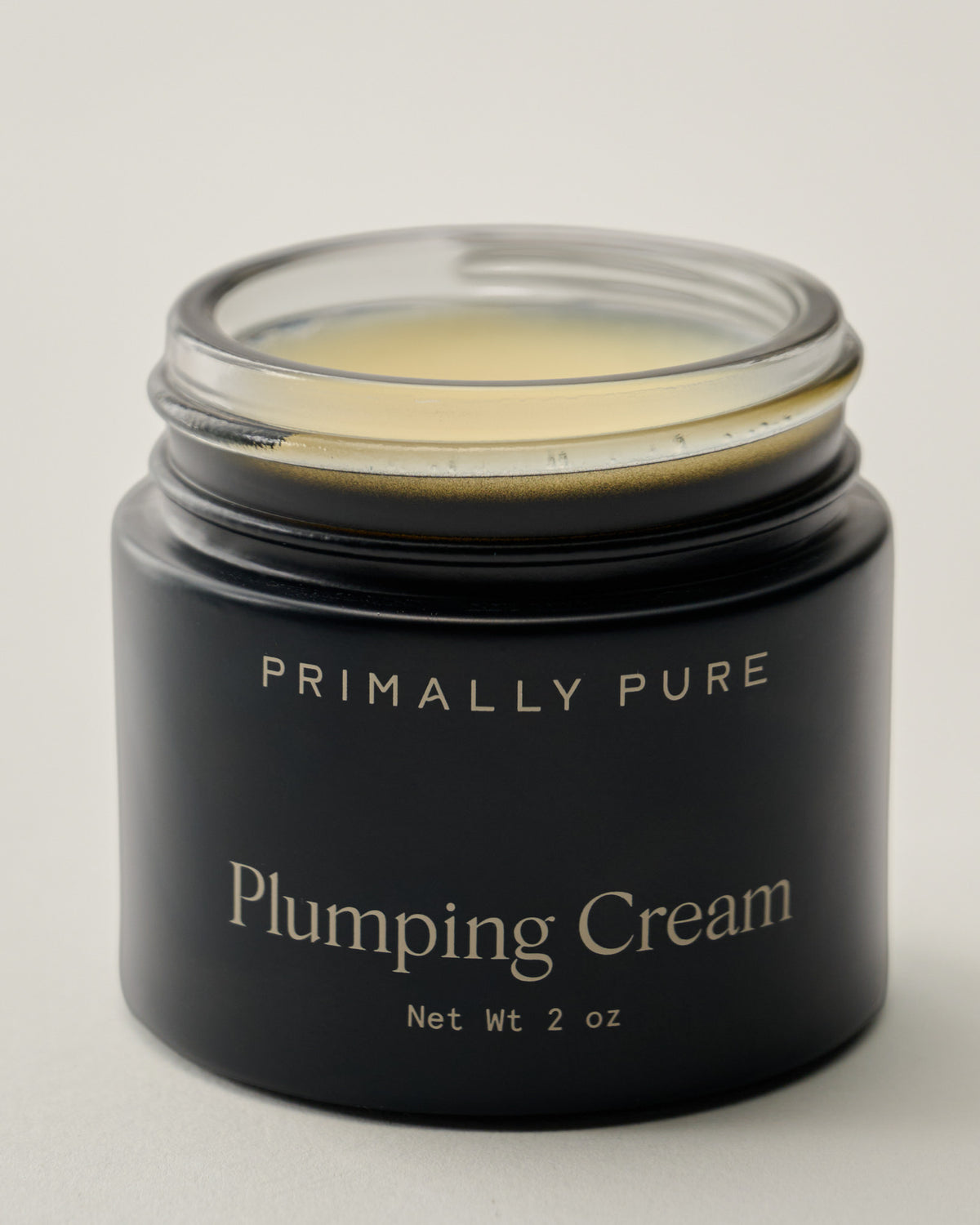 Primally Pure Plumping Cream lid off