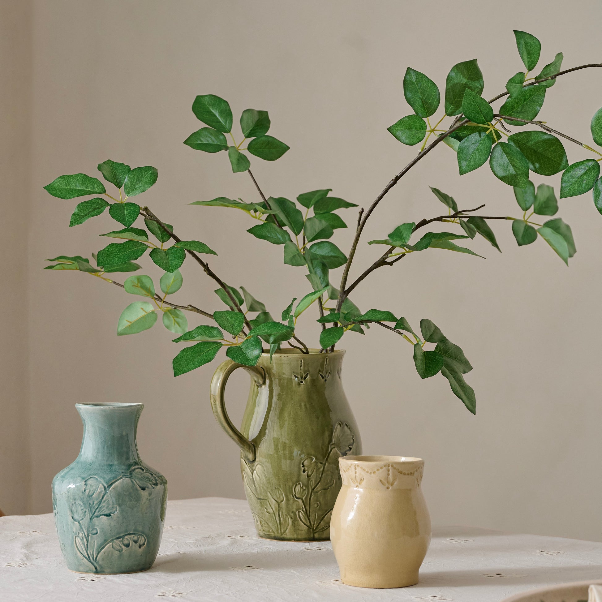 Oversized Schefflera Leaf Branch shown in vase