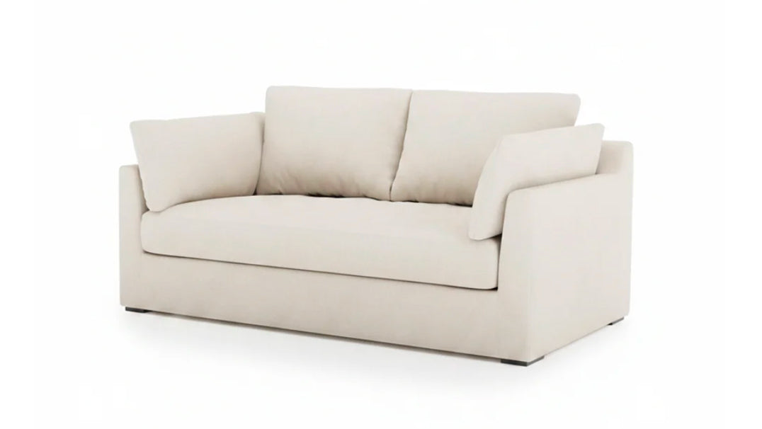 white pillow back sofa