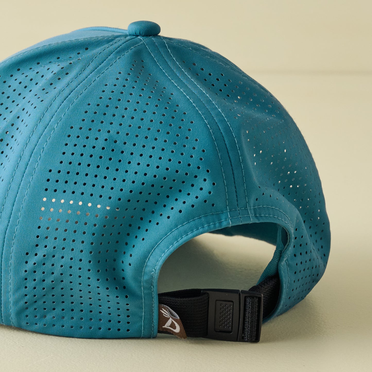 Trout Performance Perforated Storm Blue Hat back mesh with adjustable strap