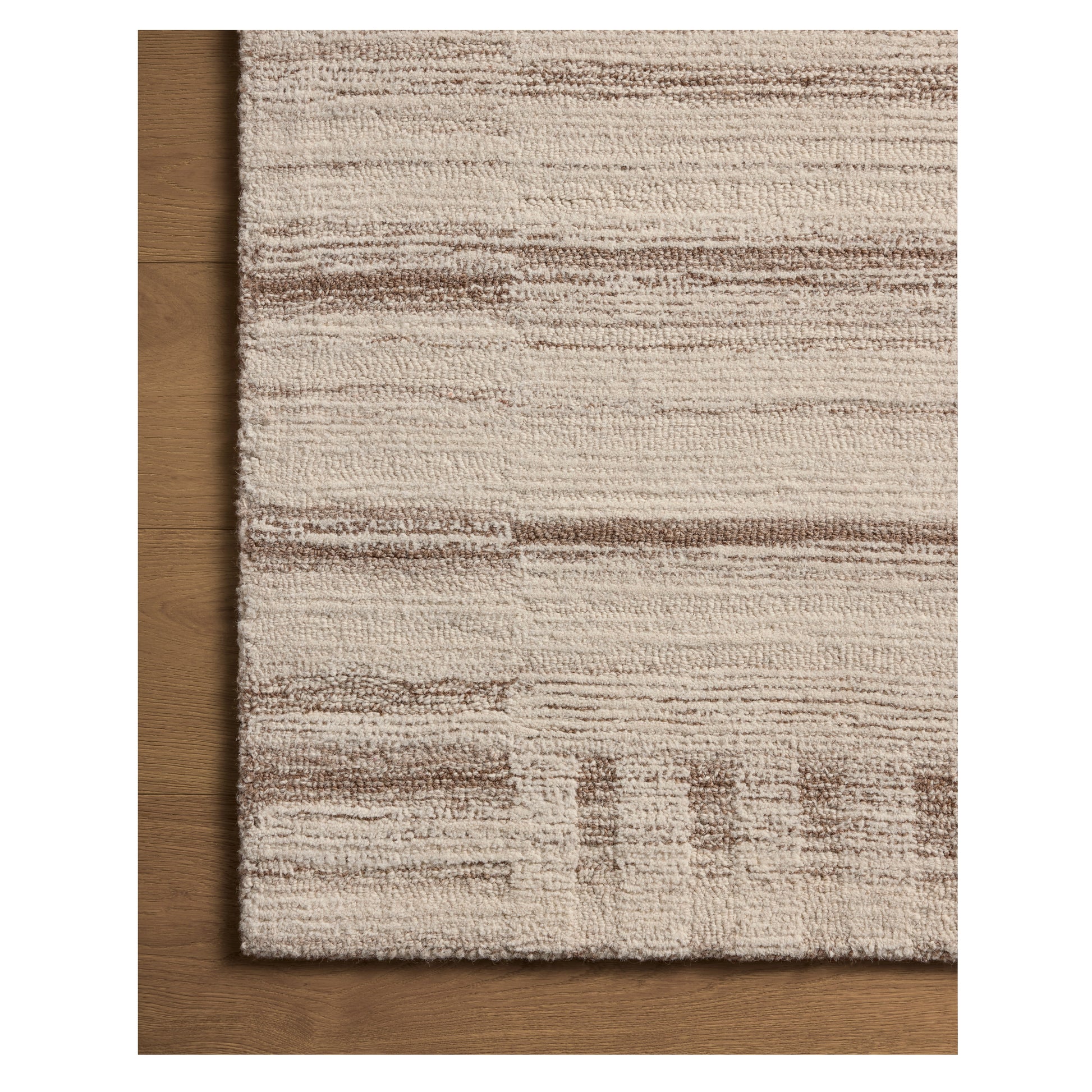 Rae Natural Oatmeal Rug close up of corner on wood floor