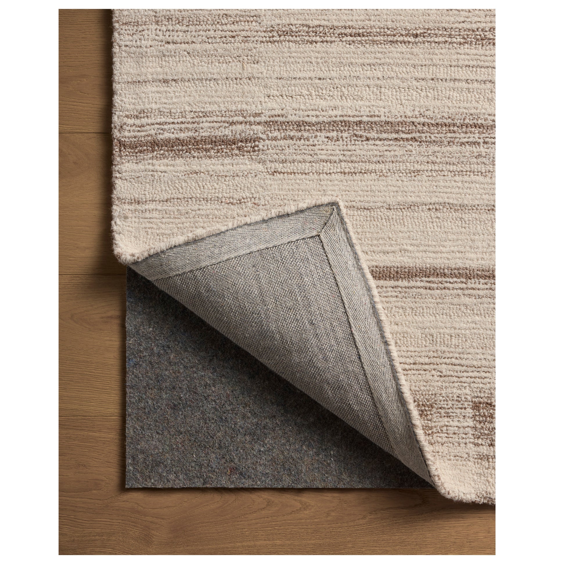 Rae Natural Oatmeal Rug corner flipped back