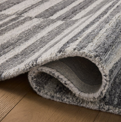 Rae Charcoal Mist Rug close up of rolled rug