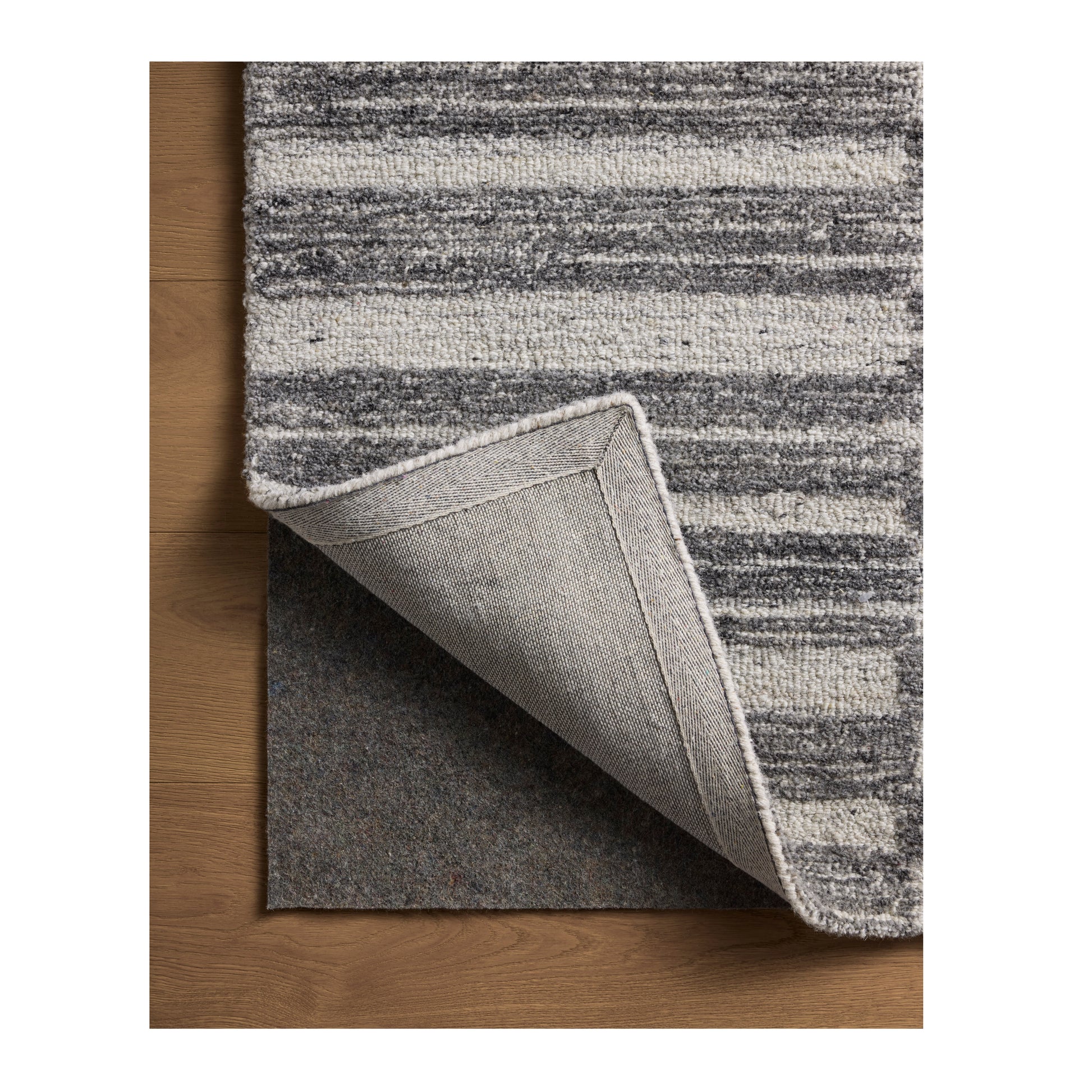 Rae Charcoal Mist Rug corner flipped back