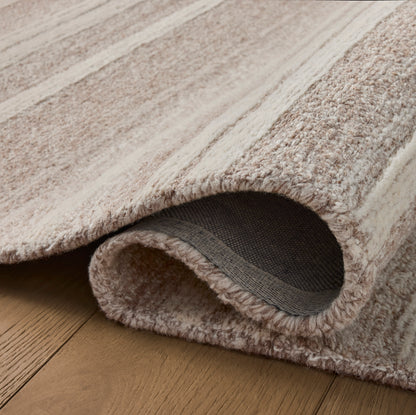 Rae Clay Ivory Rug close up of rolled rug