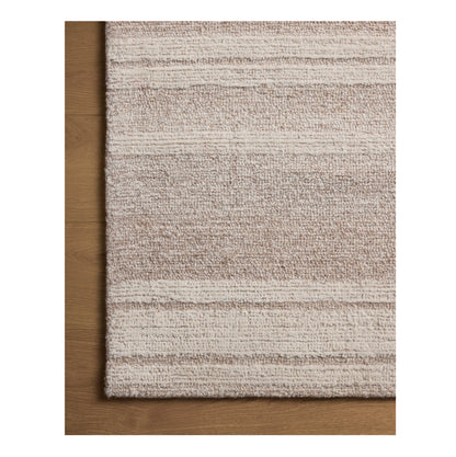 Rae Clay Ivory Rug close up of corner on wood floor