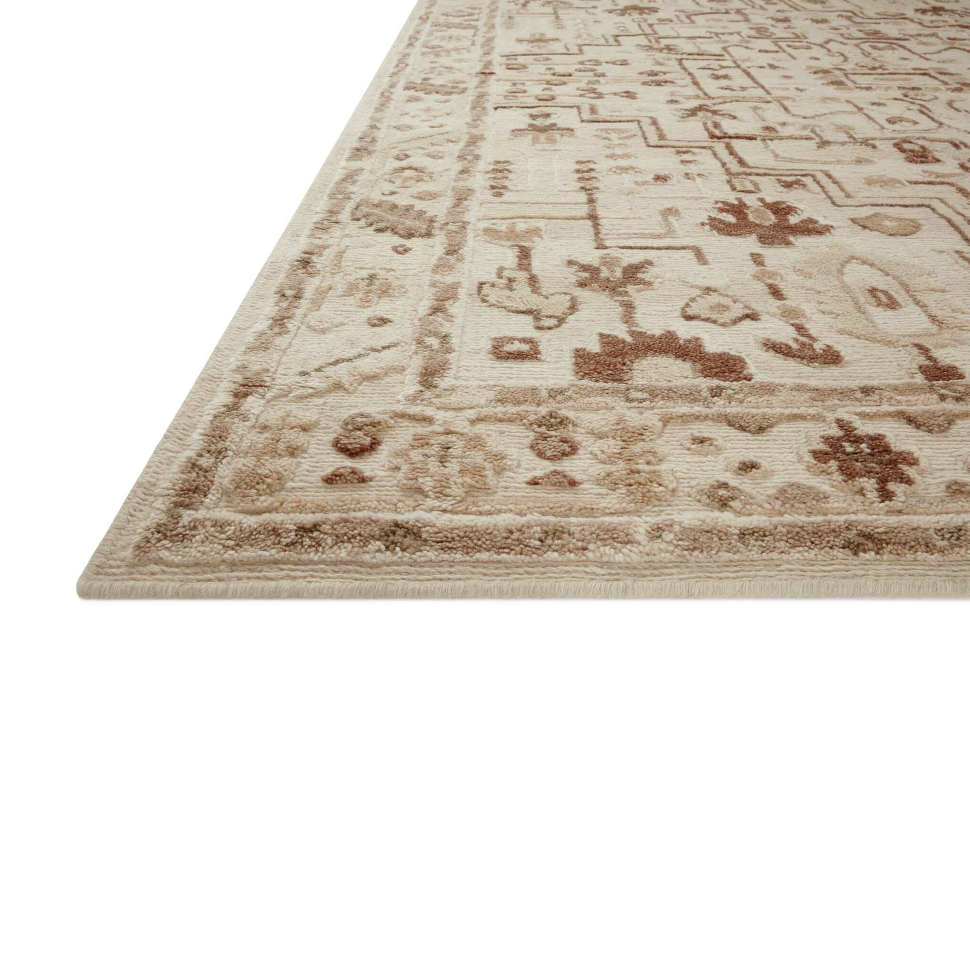 Ingrid Ivory Earth Rug close up of corner