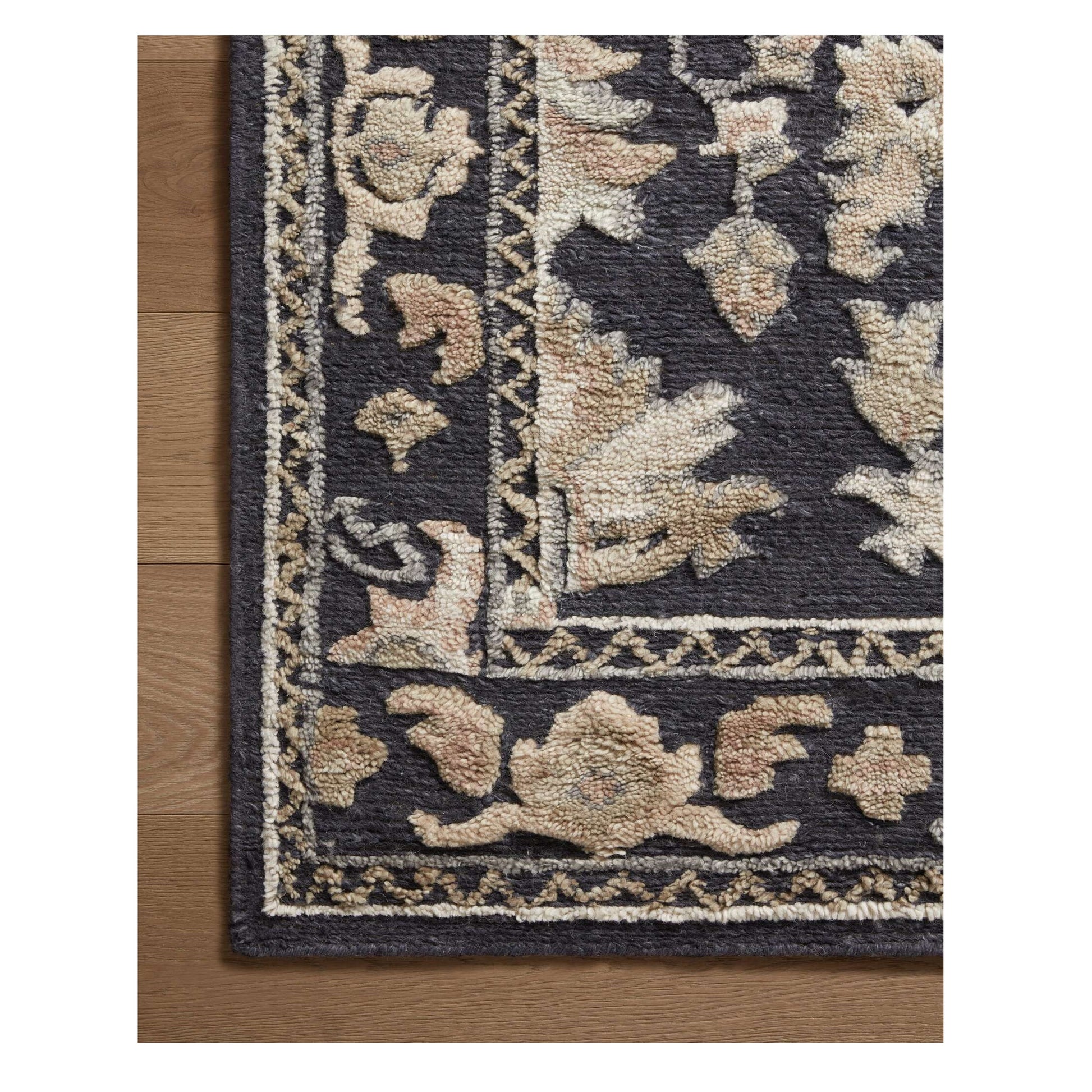 Ingrid Navy Multi Rug close up of corner of rug on wood floor