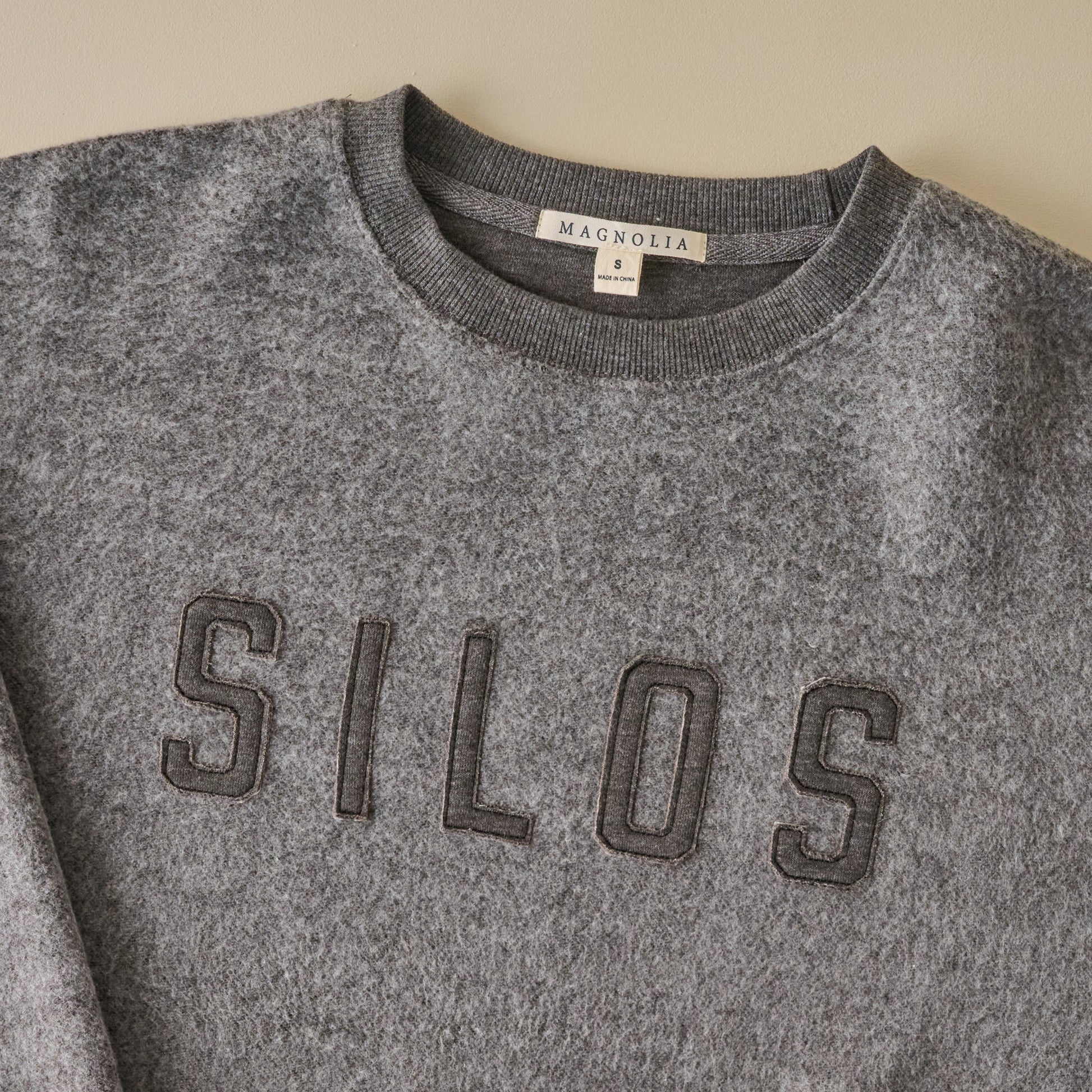 Silos Applique Charcoal Cozy Fleece up close