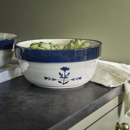 Lila Floral Mixing Bowl filled with artichokes sitting on counter 