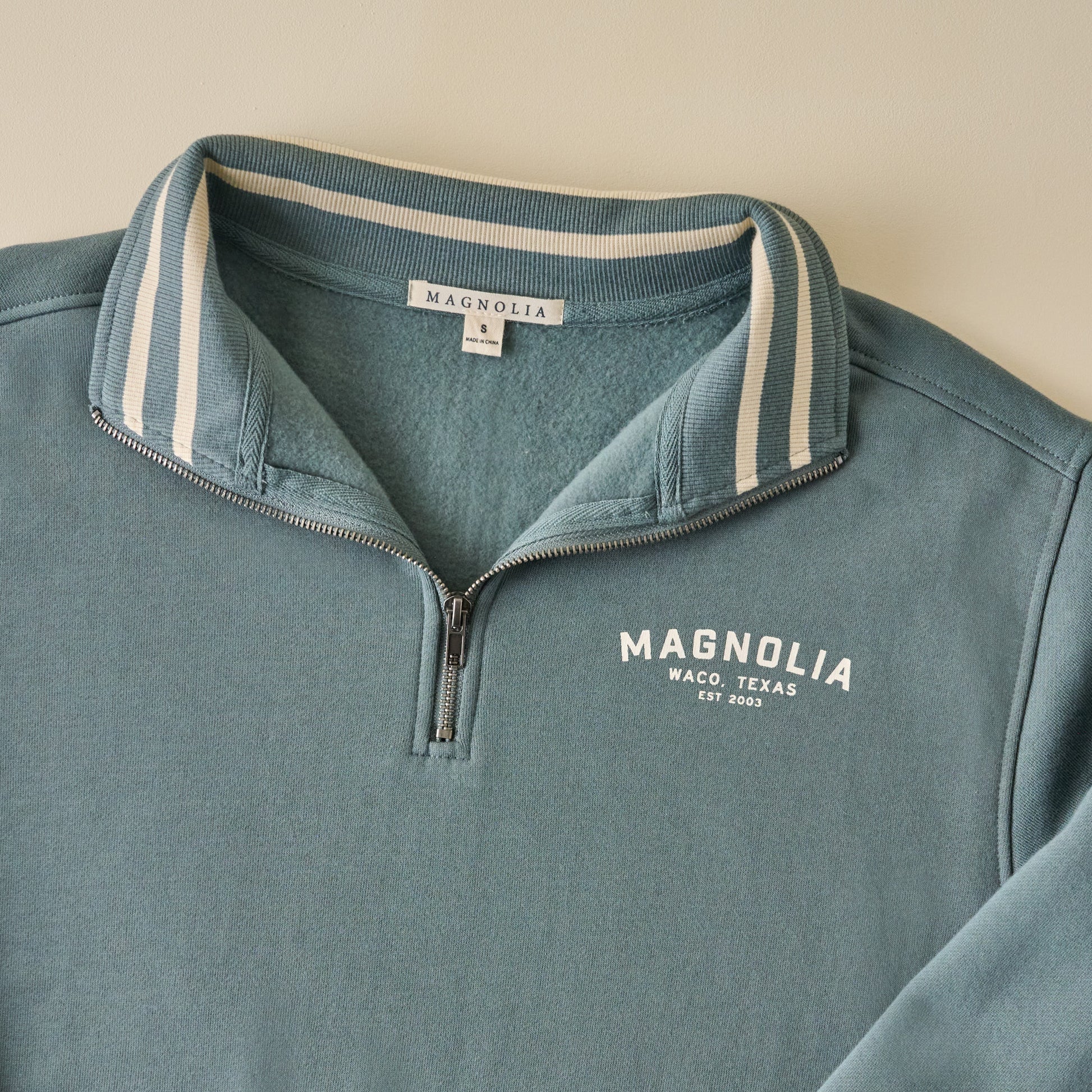 Magnolia Silos Storm Grey Quarter Zip up close