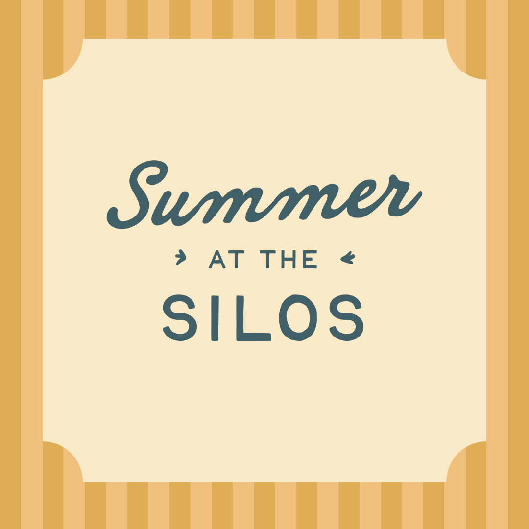 Poster with 'Summer at the Silos' text on a beige background with a wooden frame.