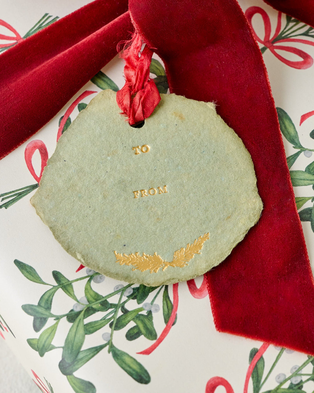 Golden Branches Gift Tag shown on gift