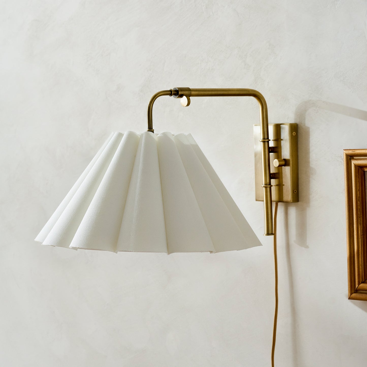 Odette Swivel Plug-In Sconce with White Linen Scallop Shade