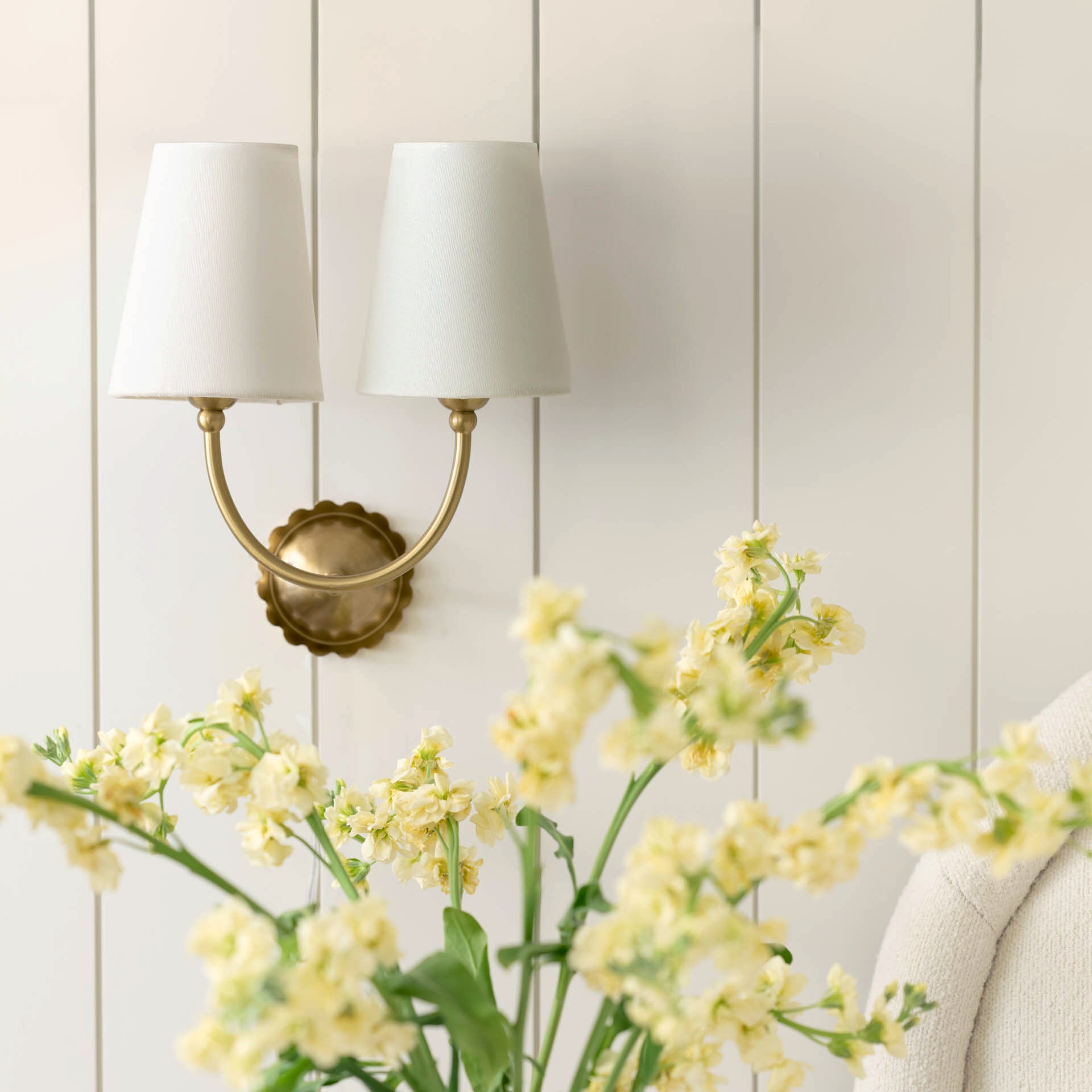 Gemma Antique-Inspired Double Sconce in a room