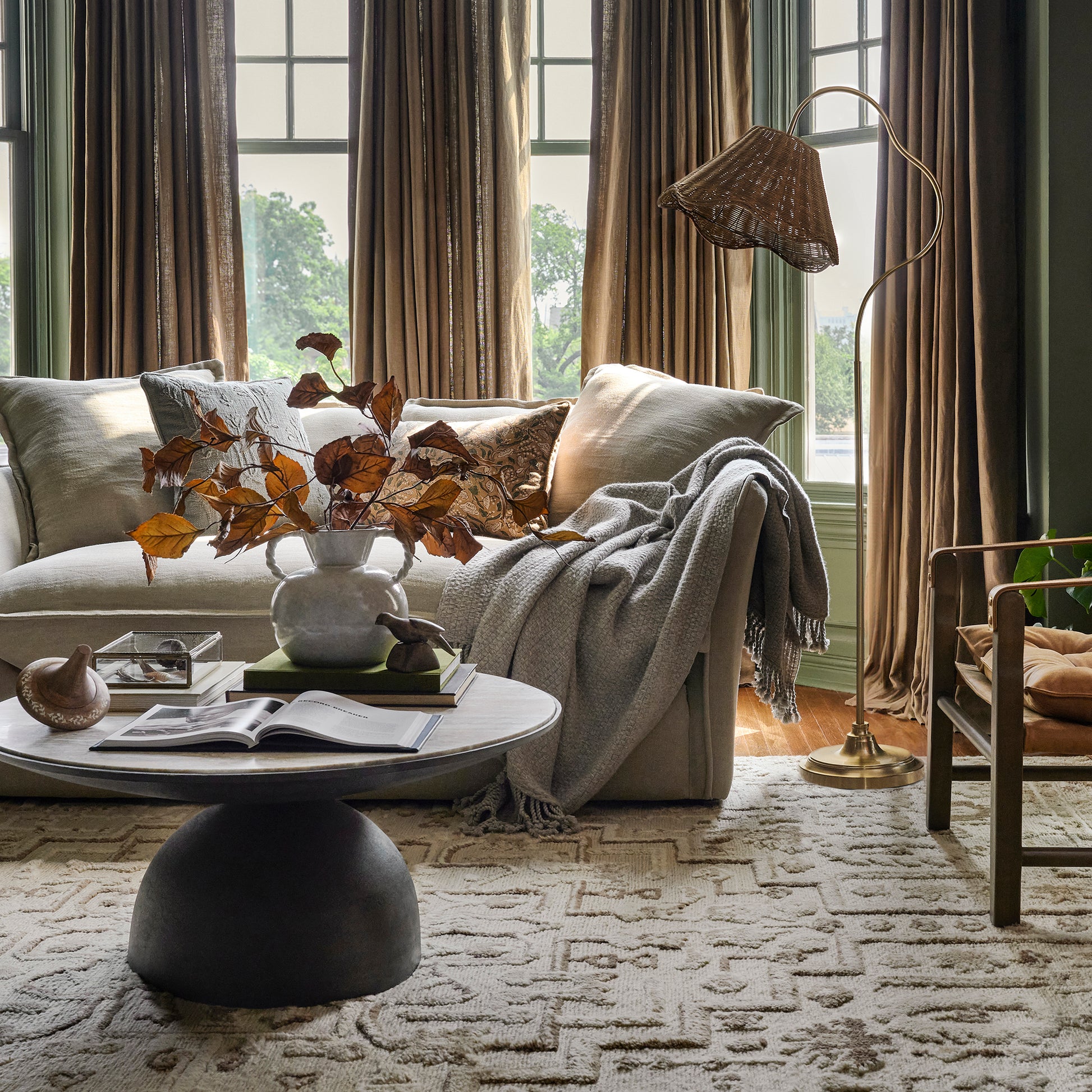 Lucinda Floor Lamp with Woven Shade in a living room