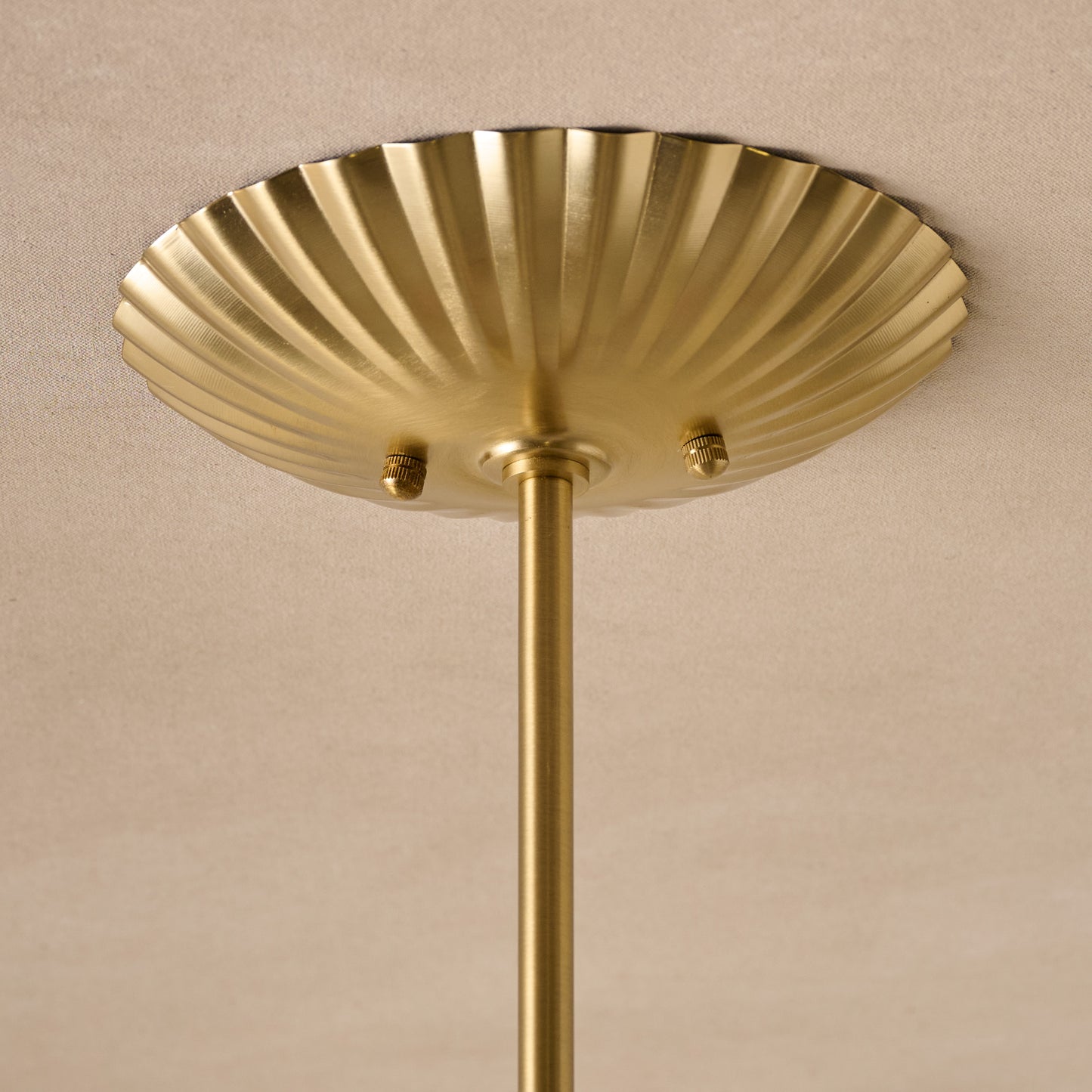 Lucinda Linear Chandelier close up of plated base