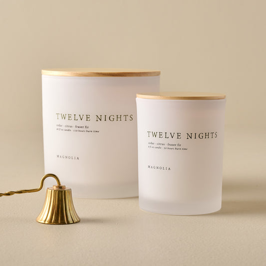 Magnolia Twelve Nights Candles shown with candle snuffer