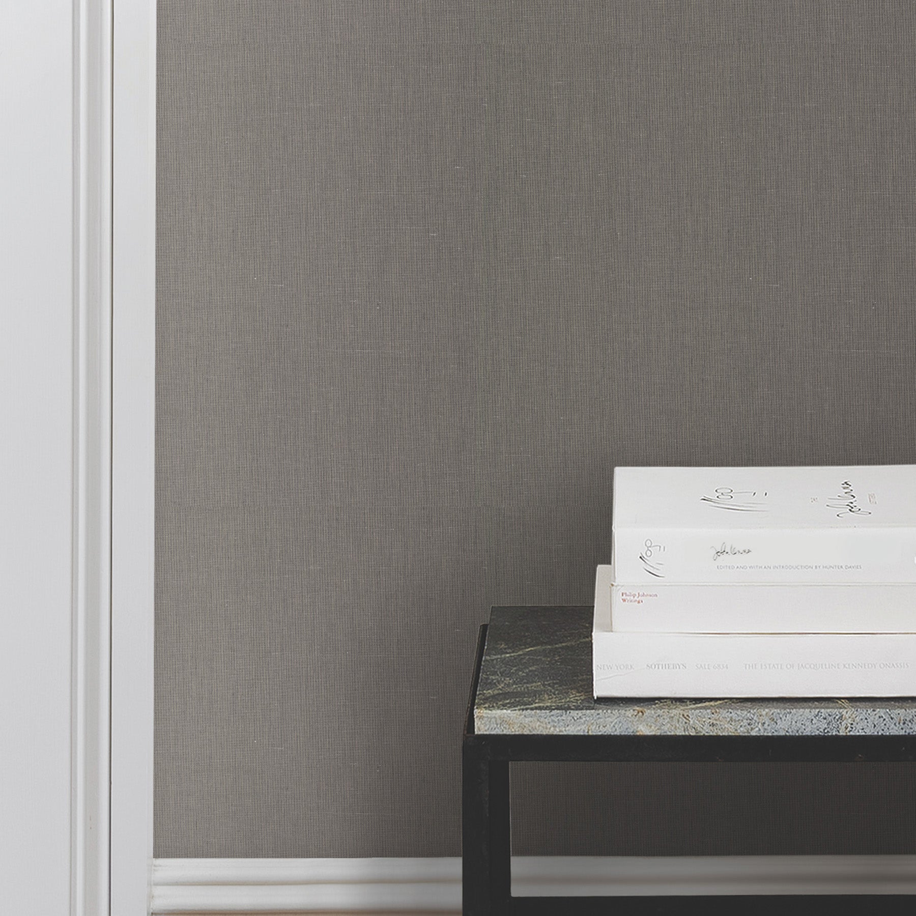 Crosshatch String Wallpaper in Black and Grey shown on wall