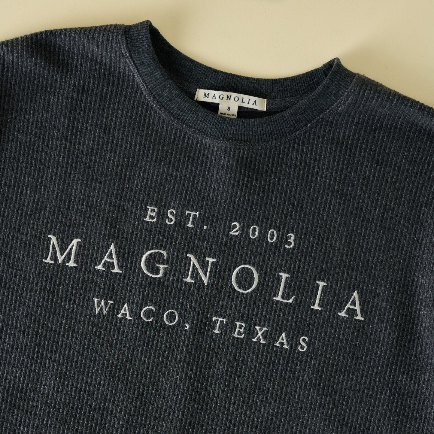 Magnolia Washed Black Embroidered Cozy Sweatshirt close up view