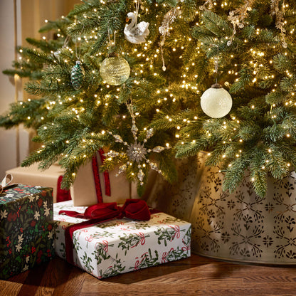 Mistletoe Classic Wrapping Paper Sheets under a tree