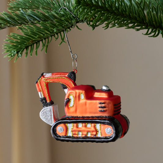 Chip's Excavator Ornament shown on tree