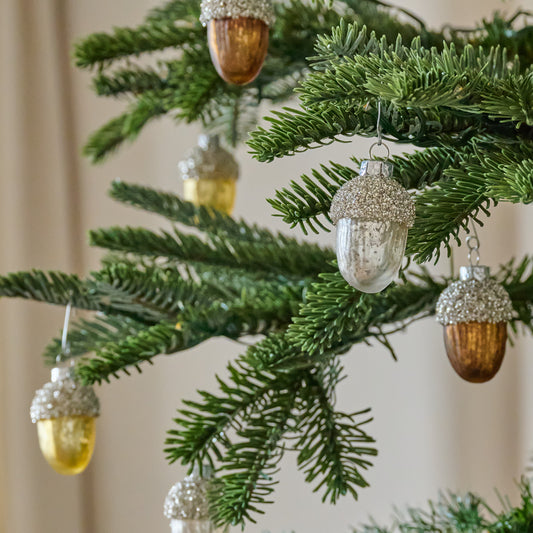 Glass Acorn Ornament, Set of 12 shown hung on tree