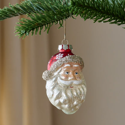 Vintage Blown Glass Santa Ornament shown on tree