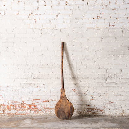 Vintage European Bakery Paddle against wall

