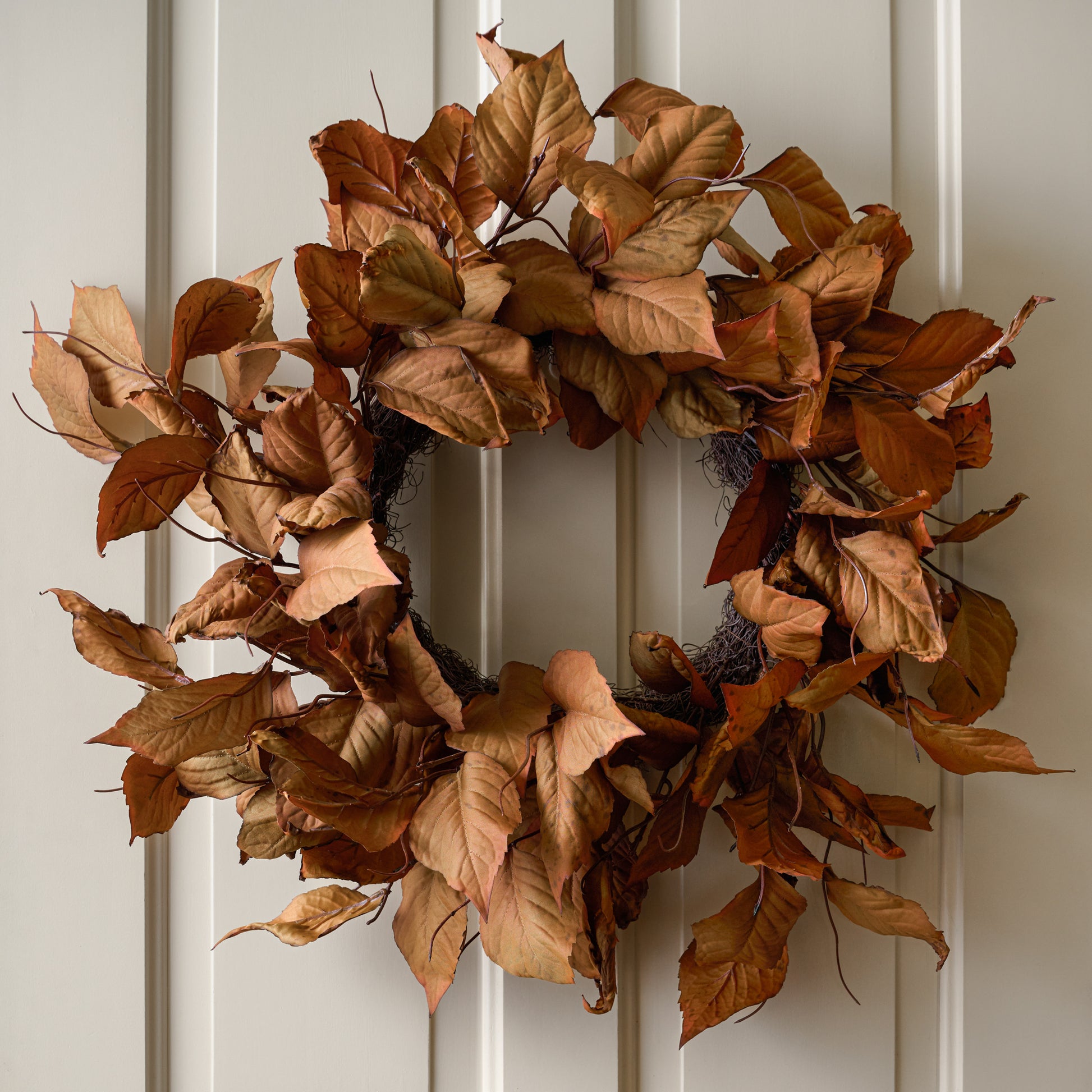 Magnolia Leaf Wreath shown on door