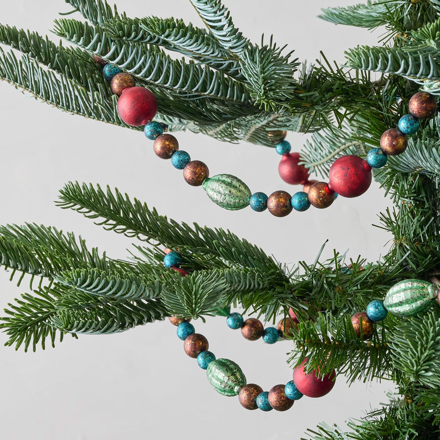 Vintage Glass Garland shown on tree