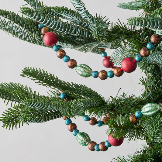 Vintage Glass Garland shown on tree