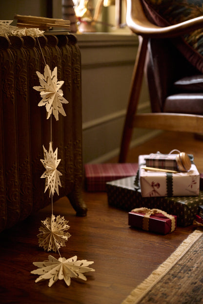 Whimsical Snowflake Garland in a room