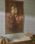 Floral Trio Vintage Tapestry shown hung above couch