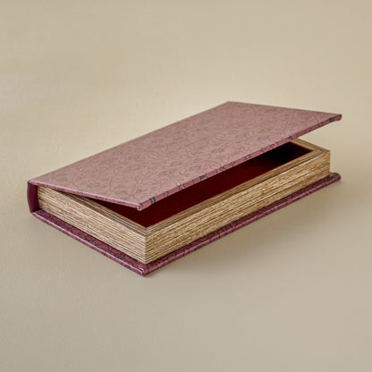 Vintage-Inspired Handcrafted Book Box with a textured pinkish-red lid on a beige background