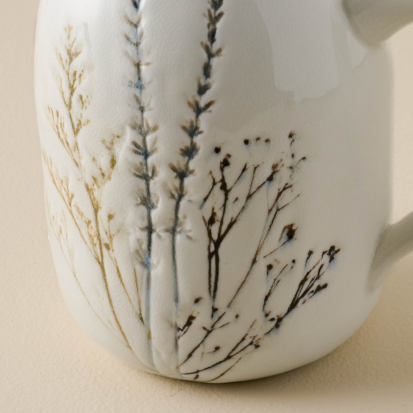 Pressed Floral Ceramic Pitcher close up