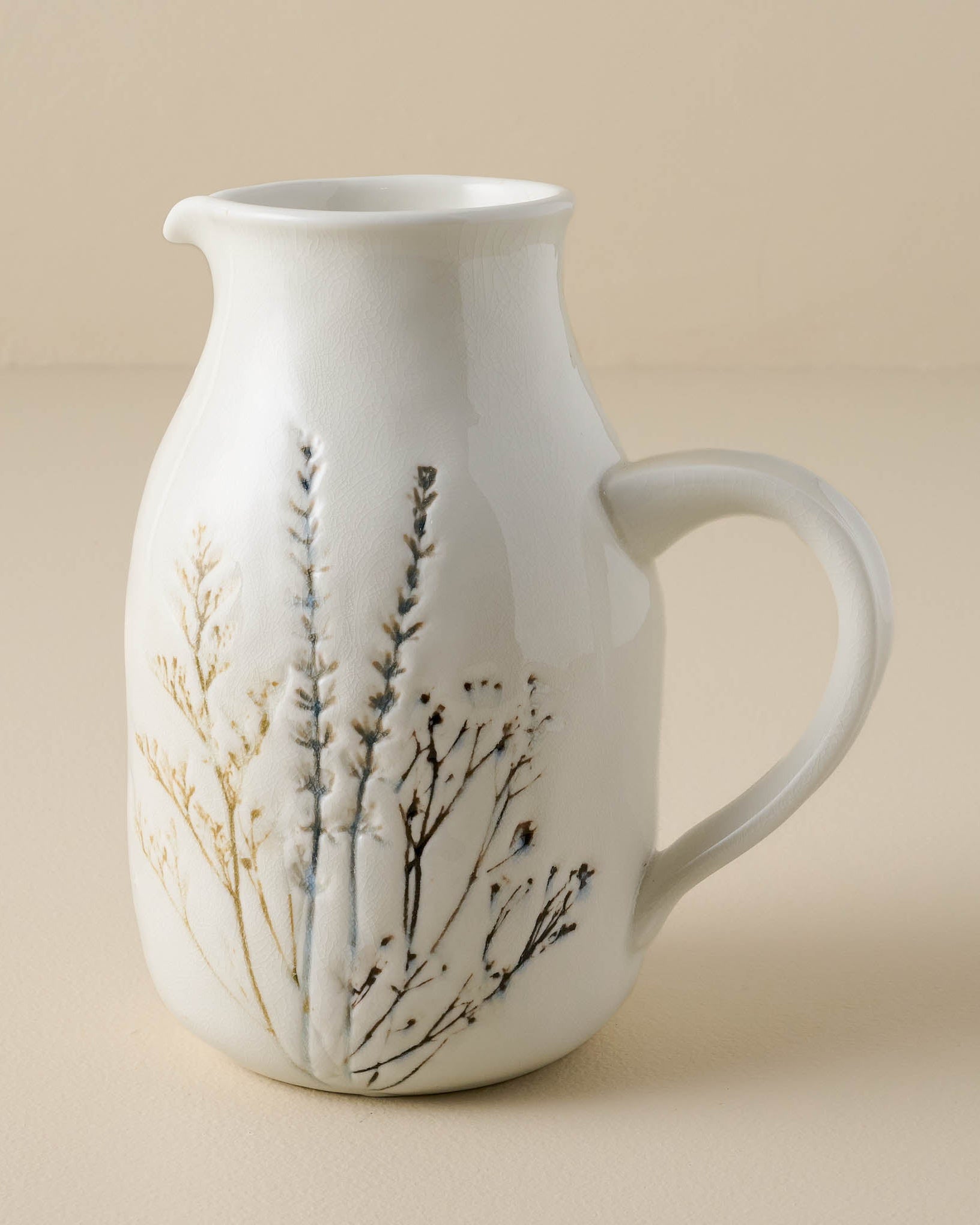 Pressed Floral Ceramic Pitcher
