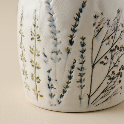 Pressed Floral Ceramic Canister close up