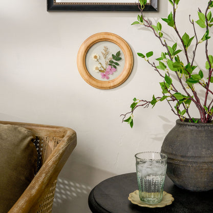 Pressed Botanicals in Wood Frame on a wall